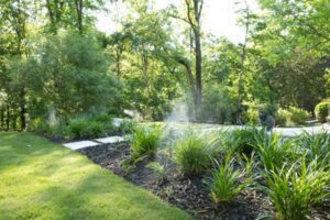 mosquito system spraying in backyard